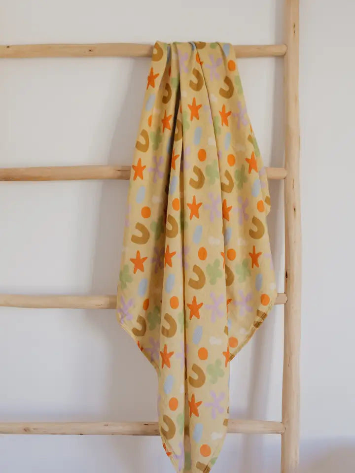 Playtime Whimsy 🍀🌟🫟🟠 Muslin Swaddle